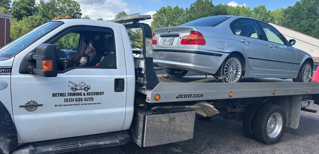 Silver BMW Sedan Flatbed Towing
